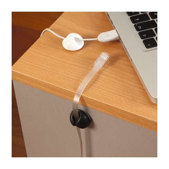  	Soporte adhesivo multifunción en suave caucho. Válido como soporte para mascarillas, lanyards, soporte para cables… Disponible en acabados blanco y negro.