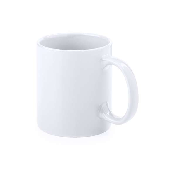 Taza de cerámica de 350ml. Diseño en color blanco especialmente diseñada para la sublimación, pudiendo transferir todo tipo de diseños a todo color. Cada taza viene presentada en caja individual kraft.