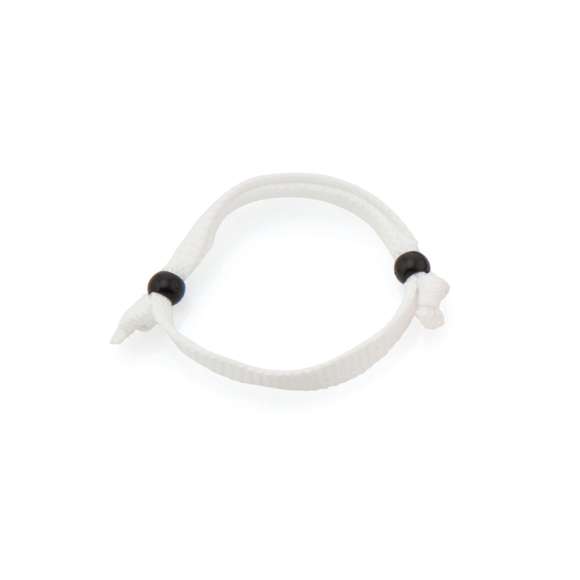 Pulsera ajustable en poliéster y amplia gama de colores. Con terminación en nudo y accesorio de ajuste.