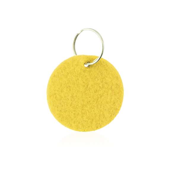  	Llavero circular con cuerpo en suave fieltro de variados y vivos colores.