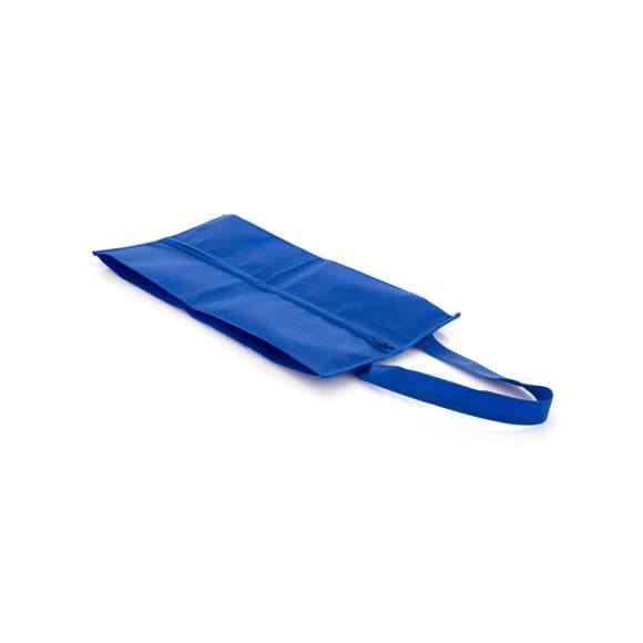 Zapatillero de non-woven en amplia gama de vivos colores. Con cremallera y cómoda asa de transporte a juego.