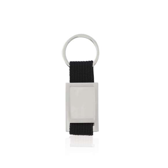  	Llavero de divertido diseño con cinta de poliéster de variados y vivos colores. Con cuerpo metálico troquelado especialmente diseñado para marcaje en doming/gota de resina.