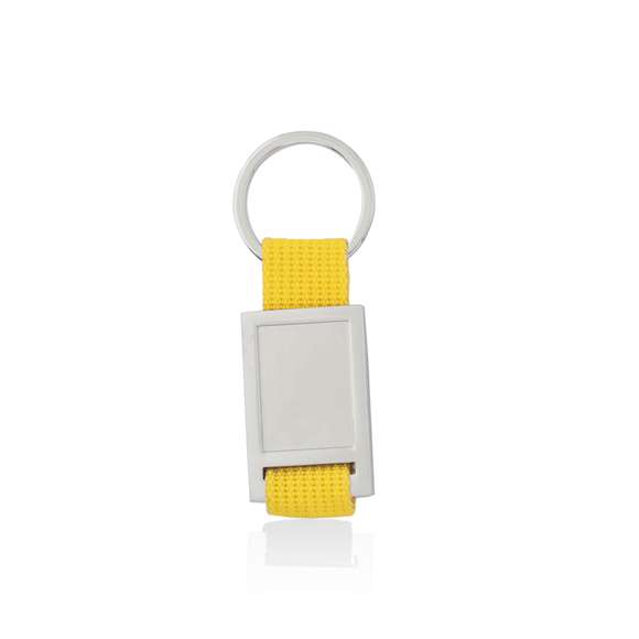  	Llavero de divertido diseño con cinta de poliéster de variados y vivos colores. Con cuerpo metálico troquelado especialmente diseñado para marcaje en doming/gota de resina.