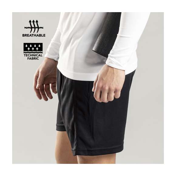 Pantalón deportivo en resistente y ligero poliéster de 145g/m2, de tejido transpirable en vivos colores. Disponible en tallas 8-10, 12-14, S, M, L, XL.
