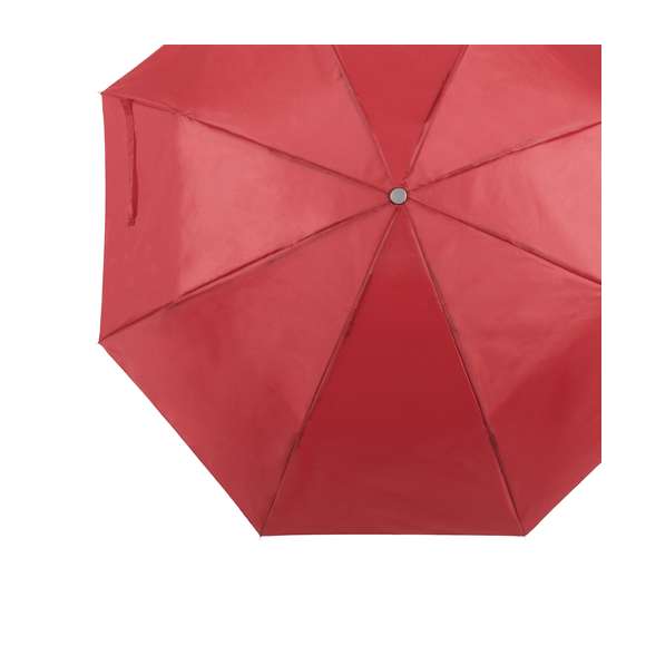 Paraguas plegable de 8 paneles de poliéster 170T en extensa gama de vivos colores y 96cm de diámetro. De apertura manual, con varillas metálicas en color plateado, cierre de velcro y cinta de transporte en mango ergonómico. Presentado en funda individual a juego.