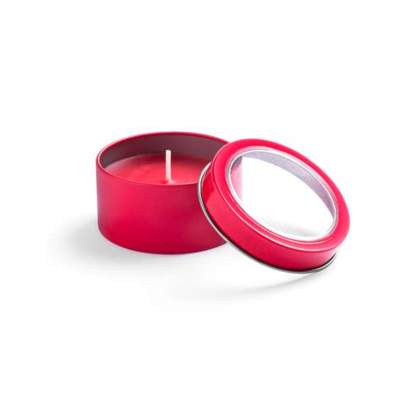 Vela aromática de fragancia vainilla presentada en original tarro metálico con ventana transparente en variada gama de vivos colores.