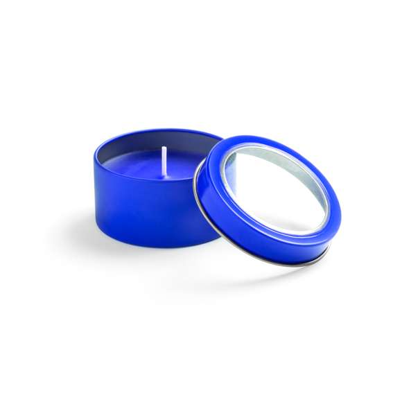 Vela aromática de fragancia vainilla presentada en original tarro metálico con ventana transparente en variada gama de vivos colores.