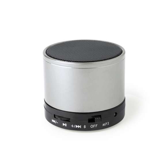 Compacto altavoz con conexión Bluetooth® 5.0 Y 3W de potencia.Función manos libres,  ranura para tarjetas mini SD de hasta 64 GB de capacidad, función radio FM y entrada auxiliar de línea mediante conexión jack de 3,5mm. Con soportes de goma antideslizantes en la base. Compatible con iOS y Android, incluye cable de carga y cable auxiliar jack de 3,5mm. Presentado en atractiva caja de diseño, con manual de instrucciones en español e inglés. Disponible en extensa gama de colores metalizados.