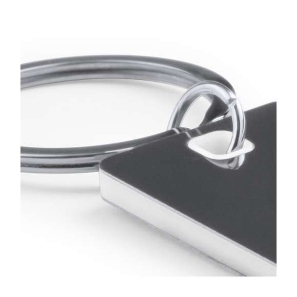 Llavero de acero inox en diseño bicolor de variados colores y especialmente diseñado para marcaje en láser.