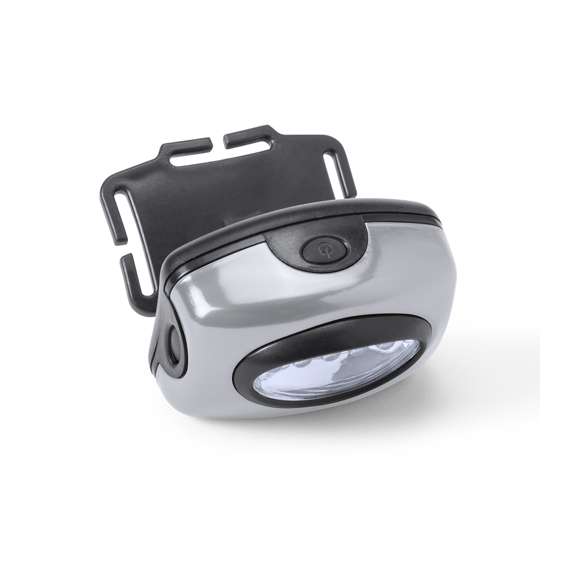 Linterna para cabeza de 5 ledes con tres modos de iluminación. Con cómoda cinta elástica ajustable y desmontable y cuerpo en resistente material en vivos colores. Alimentación a pilas: 3xAAA no incluidas. Presentado en caja individual plateada con bolsa de protección de burbuja.