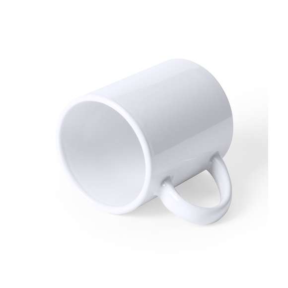 Taza de cerámica de 250ml de capacidad en color blanco y especialmente diseñada para marcaje en sublimación. Presentada en caja individual.