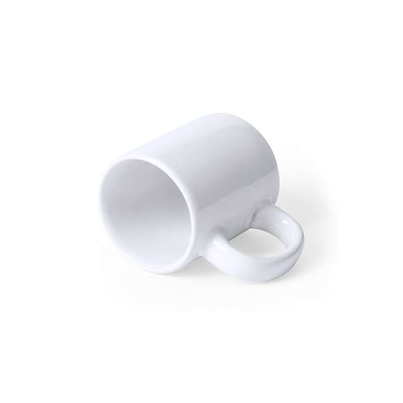 Taza de cerámica de 80ml de capacidad en color blanco. Presentada en caja individual.Disponible manual de instrucciones en español e inglés.