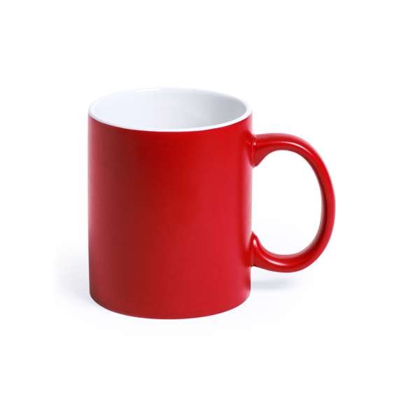 Taza de cerámica de alta calidad de 350ml de capacidad. Parte exterior en vivos colores, especialmente diseñada para marcaje en láser, e interior en color blanco. Al grabar el logotipo en la parte exterior, se muestra el color del interior de la taza. Presentada en caja individual.Disponible manual de instrucciones en español e inglés.