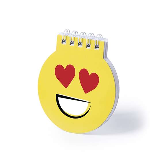 Libreta de divertidos diseños emoji en llamativo color amarillo. De anillas blancas, con tapas de cartón rígidas de suave acabado brillante y 40 hojas lisas.