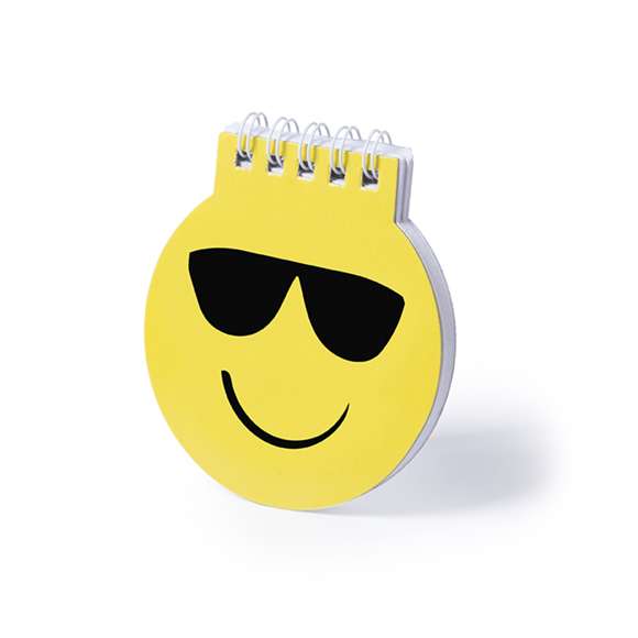 Libreta de divertidos diseños emoji en llamativo color amarillo. De anillas blancas, con tapas de cartón rígidas de suave acabado brillante y 40 hojas lisas.