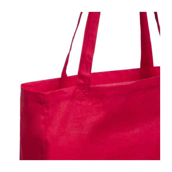 Bolsa en material 100% algodón en variada gama de vivos colores. Con asas largas de 70cm, fuelle y acabado cosido. Resistencia hasta 7kg de peso.