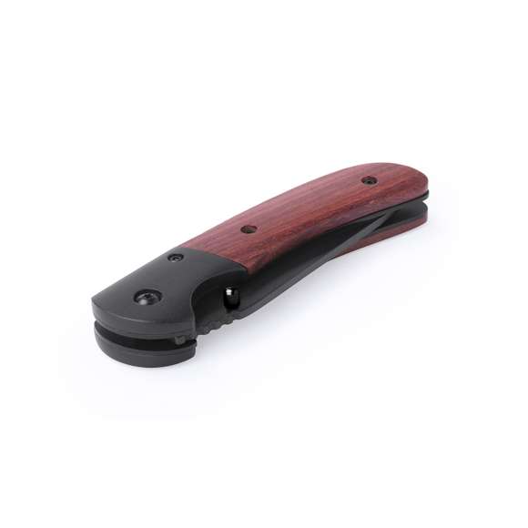Navaja de alta calidad con hoja en acero inox de color negro y empuñadura en madera natural con bloqueo de seguridad. Presentada en caja individual.