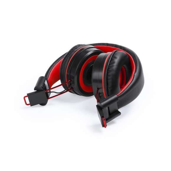 Auriculares plegables de diadema con conexión Bluetooth® y desenfadado diseño bicolor en variada gama de vivos tonos brillantes. Con panel de control integrado en el auricular, función manos libres y recargables mediante cable USB -incluido-. Almohadillas en suave polipiel con interior a juego y presentados en atractiva caja de diseño.