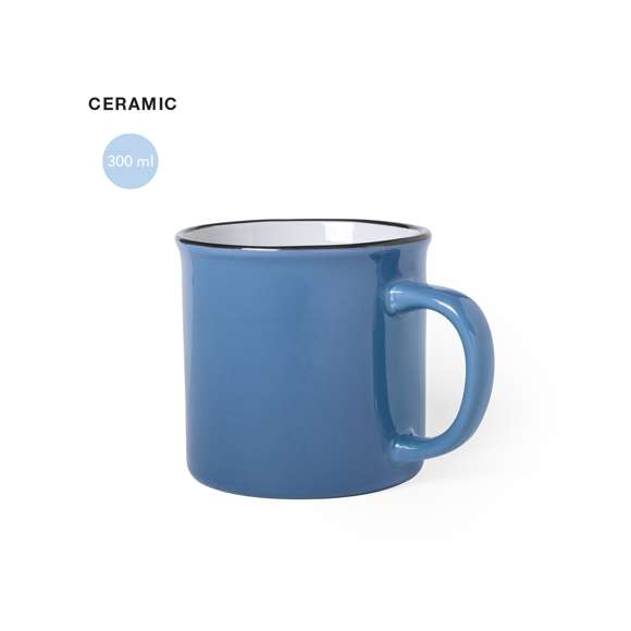 Taza de cerámica de 300ml de capacidad con diseño vintage. en combinación de exterior en variada gama de colores e interior en color blanco con borde negro. Presentada en caja individual.Disponible manual de instrucciones en español e inglés.