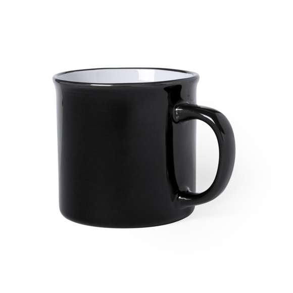 Taza de cerámica de 300ml de capacidad con diseño vintage. en combinación de exterior en variada gama de colores e interior en color blanco con borde negro. Presentada en caja individual.Disponible manual de instrucciones en español e inglés.