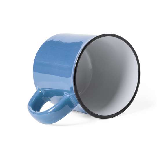 Taza de cerámica de 300ml de capacidad con diseño vintage. en combinación de exterior en variada gama de colores e interior en color blanco con borde negro. Presentada en caja individual.Disponible manual de instrucciones en español e inglés.