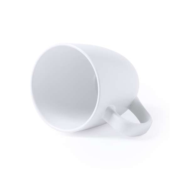 Taza de cerámica de 470ml de capacidad con exterior en variada gama de vivos colores e interior en color blanco. Presentada en caja individual.