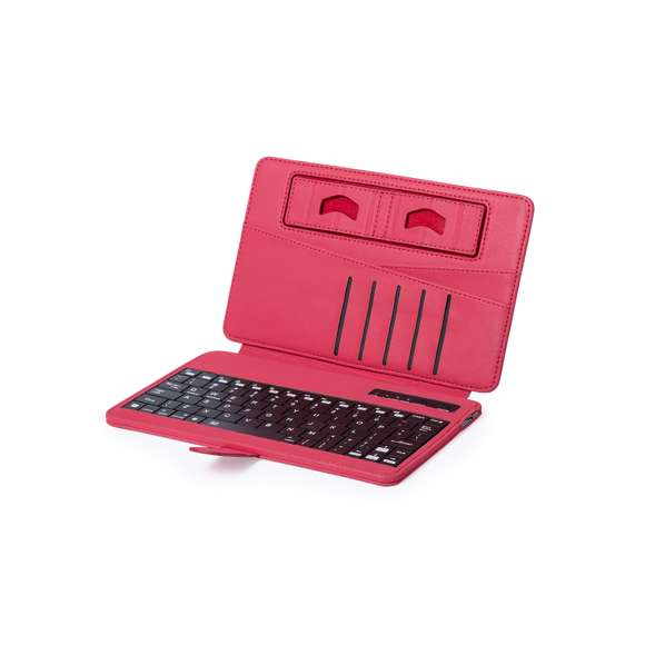 Teclado soporte Bluetooth® con función soporte para dispositivo móvil en suave acabado de polipiel. De diseño compacto, con solapa de cierre magnético, tarjeteros interiores, en atrevidos colores y recargable mediante cable mini USB -incluido-. Compatible con cualquier sistema operativo y presentado en atractiva caja de diseño.