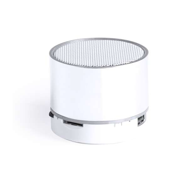 Compacto altavoz de conexión Bluetooth® con interior iluminado. Superficie exterior especialmente diseñada para marcaje en láser y así iluminar el logotipo marcado. De diseño bicolor con suave acabado y conexión Bluetooth® 3.0, ofrece 3W de potencia, tiene función de manos libres, una ranura para tarjetas micro SD de hasta 32 GB de capacidad, función radio FM, entrada auxiliar de línea mediante conexión jack de 3,5mm y soportes de goma antideslizantes en la base. Compatible con iOS y Android, incluye cable de carga mini USB, cable auxiliar jack de 3,5mm y viene presentado en atractiva caja de diseño. Con base antideslizante.