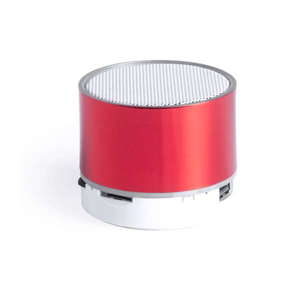 Compacto altavoz de conexión Bluetooth® con interior iluminado. Superficie exterior especialmente diseñada para marcaje en láser y así iluminar el logotipo marcado. De diseño bicolor con suave acabado y conexión Bluetooth® 3.0, ofrece 3W de potencia, tiene función de manos libres, una ranura para tarjetas micro SD de hasta 32 GB de capacidad, función radio FM, entrada auxiliar de línea mediante conexión jack de 3,5mm y soportes de goma antideslizantes en la base. Compatible con iOS y Android, incluye cable de carga mini USB, cable auxiliar jack de 3,5mm y viene presentado en atractiva caja de diseño. Con base antideslizante.