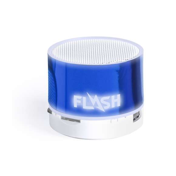 Compacto altavoz de conexión Bluetooth® con interior iluminado. Superficie exterior especialmente diseñada para marcaje en láser y así iluminar el logotipo marcado. De diseño bicolor con suave acabado y conexión Bluetooth® 3.0, ofrece 3W de potencia, tiene función de manos libres, una ranura para tarjetas micro SD de hasta 32 GB de capacidad, función radio FM, entrada auxiliar de línea mediante conexión jack de 3,5mm y soportes de goma antideslizantes en la base. Compatible con iOS y Android, incluye cable de carga mini USB, cable auxiliar jack de 3,5mm y viene presentado en atractiva caja de diseño. Con base antideslizante.
