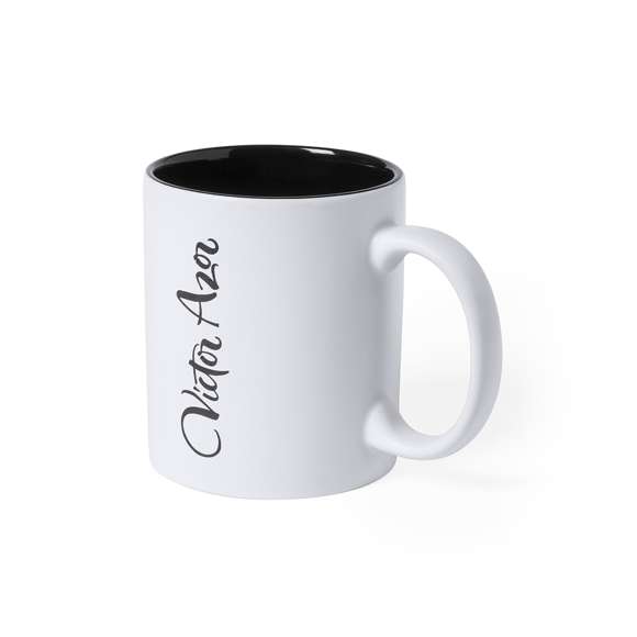 Taza de cerámica de alta calidad de 350ml de capacidad. Parte exterior en color blanco, especialmente diseñada para marcaje en láser, e interior en vivos colores. Al grabar el logotipo en la parte exterior, se muestra el color del interior de la taza. Presentada en caja individual.Disponible manual de instrucciones en español e inglés.