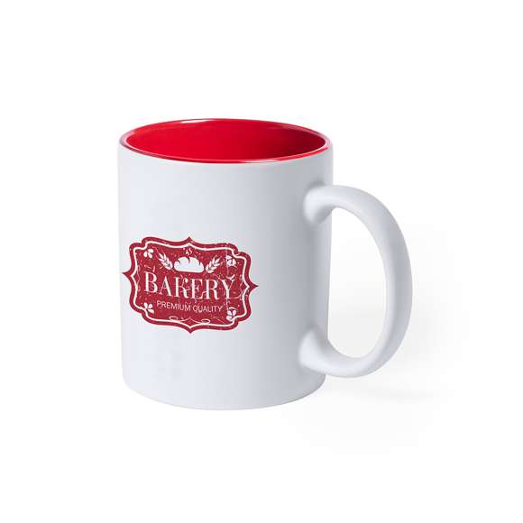 Taza de cerámica de alta calidad de 350ml de capacidad. Parte exterior en color blanco, especialmente diseñada para marcaje en láser, e interior en vivos colores. Al grabar el logotipo en la parte exterior, se muestra el color del interior de la taza. Presentada en caja individual.Disponible manual de instrucciones en español e inglés.