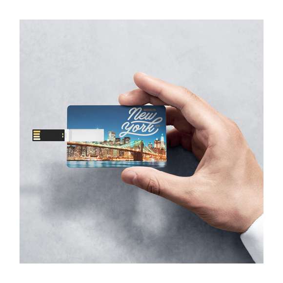 Memoria USB tarjeta de 16GB de capacidad. De diseño ultraplano, mecanismo plegable y especialmente diseñada para marcaje a todo color en digital. Presentada en elegante funda individual de polipiel blanca.
