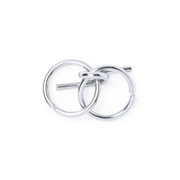 Set de 4 juegos de habilidad de acero inox para los jugadores más ingeniosos. Presentado en bolsita de color crudo con cordón de cierre auto ajustable.