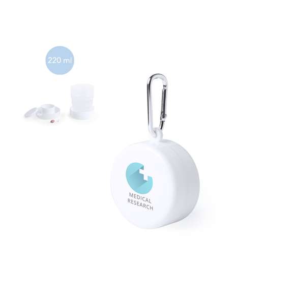 Original vaso plegable para emergencias en elegante color blanco. De 220ml de capacidad y pastillero con tapa integrado en el tapón. Con mosquetón metálico de transporte.