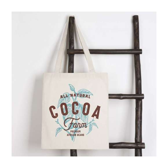 Bolsa en resistente material 100% algodón de 180g/m2 con acabado en color natural. Con asas largas de 70cm y acabado cosido. Resistencia hasta 8kg de peso.