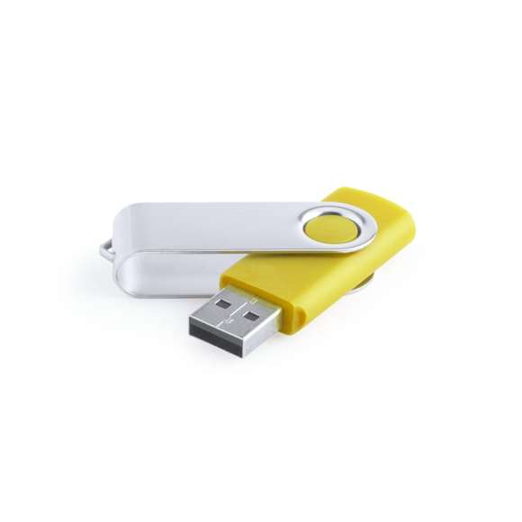 Memoria USB de 32GB de capacidad, con mecanismo giratorio, cuerpo de suave acabado y clip metálico. Presentada en estuche individual.