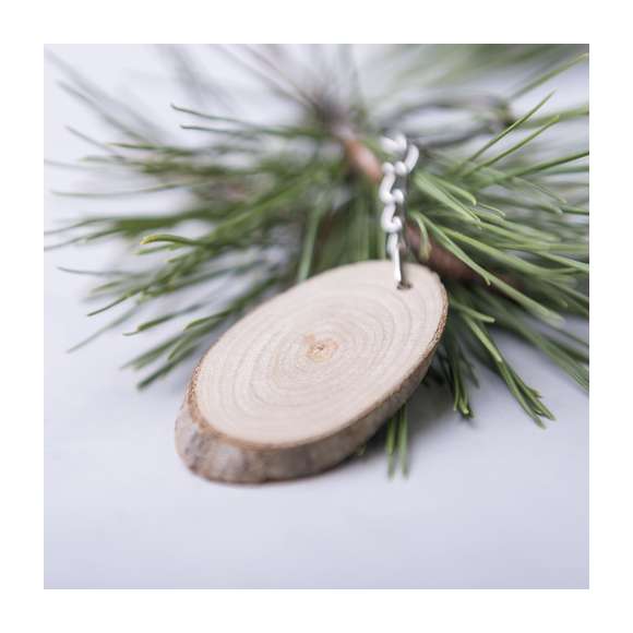  	Elegante llavero de línea nature. Piezas obtenidas al corte de madera de haya, por lo que su textura, color y grosor pueden variar, convirtiéndolo así en una pieza única.Con amplia superficie de marcaje y disponible en diseños ovalado y redondeado.