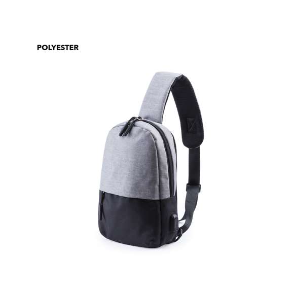  	Bandolera multiusos en resistente poliéster 300D. De atractivo diseño urbano, en combinación de colores gris denim y negro. Con conexión USB para carga -powerbank y cable no incluídos- y bolsillo acolchado para tablet de hasta 10 pulgadas. Espalda y cinta acolchadas, con cinta de ajuste regulable. Bolsillo principal de fácil apertura, con cierre de cremallera y resistentes tiradores.