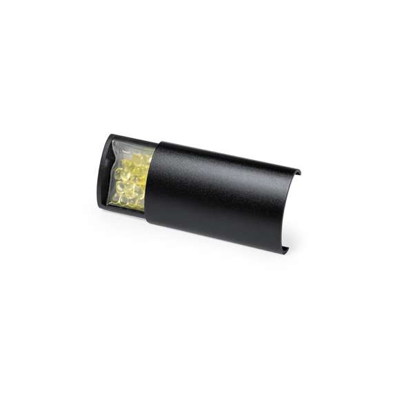  	Ambientador para rejilla de coche en elegante diseño. Con frontal deslizante en aluminio granulado y resistente pinza para rejilla. Con bolitas de perfume de aroma limón y disponible en acabados plateado y negro.