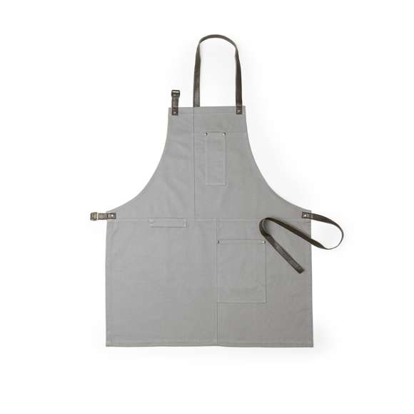 Delantal pro de alta calidad en resistente material 100% algodón canvas de 340g/m2. De corte por debajo de la rodilla, con cintas de cuello y cintura en resistente polipiel con ajuste mediante hebilla y reforzado con remaches metálicos. Incluye multitud de bolsillos para los distintos utensilios, con las costuras reforzadas.