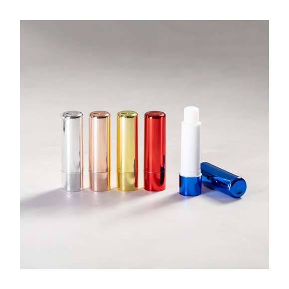 Barra de bálsamo labial con protección SPF15 y aroma vainilla. En variada gama de colores metalizados.