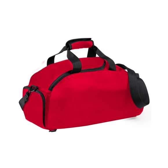 Bolso mochila en resistente nylon 420D. Compartimento independiente de cierre de cremallera para el calzado y bolsillo lateral de cremallera. Compartimento principal con cierre de cremallera de doble tirador y asas de transporte reforzadas, con cierre de velcro. Cintas de hombros y espalda acolchadas con cintas de ajuste regulables.