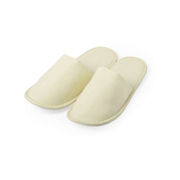 Zapatillas unisex en algodón/poliéster. Confortable interior acolchado y pespuntes de refuerzo. Talla única 36-43, disponibles en color natural.