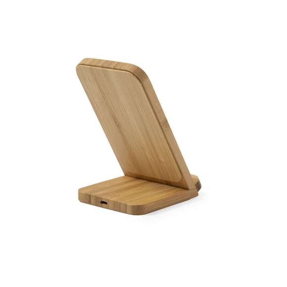 Cargador inalámbrico de línea nature con función soporte para smartphone. Hecho en bambú procedente de cortes naturales. Indicador de estado de carga y compatible con dispositivos equipados con tecnología de carga inalámbrica. Amplia superficie de marcaje y presentado en atractiva caja de diseño eco.