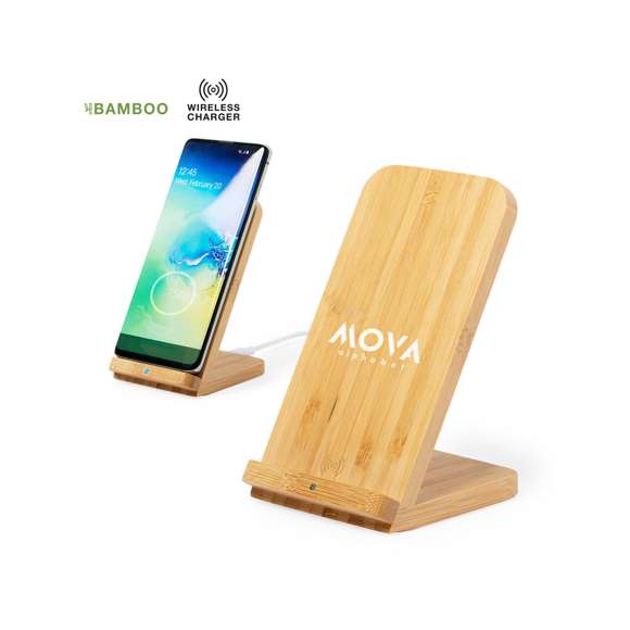 Cargador inalámbrico de línea nature con función soporte para smartphone. Hecho en bambú procedente de cortes naturales. Indicador de estado de carga y compatible con dispositivos equipados con tecnología de carga inalámbrica. Amplia superficie de marcaje y presentado en atractiva caja de diseño eco.
