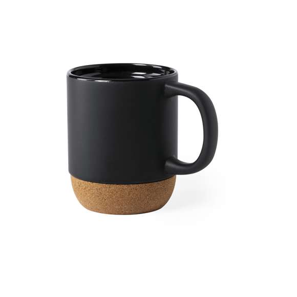 Taza de línea nature de 420 ml de capacidad. Fabricada en cerámica, con base de corcho natural. Disponible en elegantes acabados blanco y negro y presentada en caja individual de diseño eco.Disponible manual de instrucciones en español e inglés.