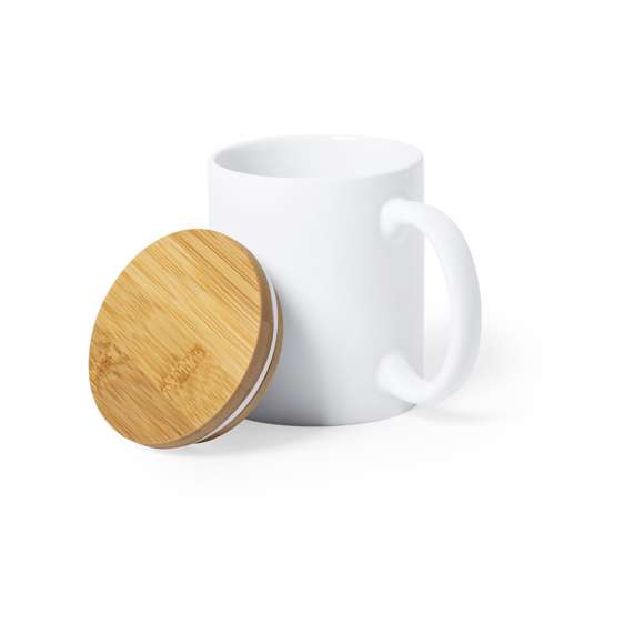 Taza de línea nature de 370 ml de capacidad. Fabricada en cerámica de acabado mate, con tapa de bambú pulido y presentada en caja individual de diseño eco.Disponible manual de instrucciones en español e inglés.