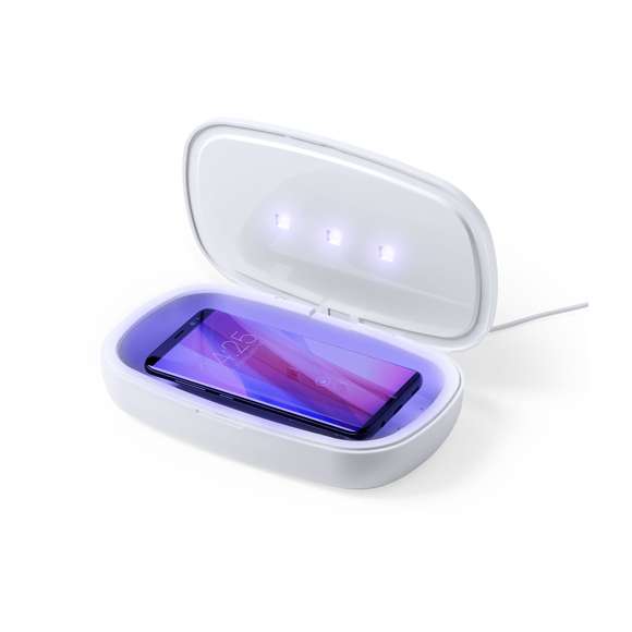 Caja esterilizadora de luz ultravioleta tipo C, con cargador inalámbrico para smartphone integrado en tapa. Especialmente diseñada para la eliminación de microorganismos y bacterias en objetos de uso cotidiano como el smartphone, llaves, gafas, mascarilla, auriculares, smartwatch... Fabricada en resistente material ABS de acabado mate y presentada en atractiva caja individual de diseño.  Fácil de usar, basta con introducir el objeto dentro de la caja. Potencia de bombilla 1W longitud de onda de 270-280 nm, con alimentación mediante cable USB Tipo C de 1m de largo con color a juego. Tiempo de esterilización de 5 y 10 minutos con función auto-apagado.  Disponible manual de usuario en español e inglés. Disponible certificación CE, RoHS y de efectividad germicida. Para un uso adecuado del producto, evitar el contacto con la piel y los ojos.