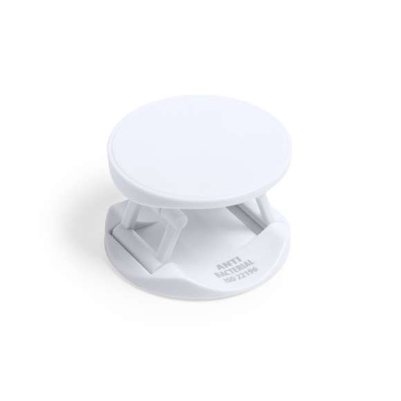 Soporte antibacteriano para smartphone. Diseño plegable en elegante acabado de color blanco, especialmente diseñado para marcaje en tampografía. Con adhesivo 3M, de fijación extra fuerte y libre de residuos al despegarlo del dispositivo.Los productos con tratamientos antibacterianos son capaces de reducir drásticamente las cargas bacterianas presentes en las superficies de los materiales, gracias a la incorporación de agentes microbianos permanentes estáticos, con alta efectividad para inhibir y prevenir la contaminación bacteriana.Artículo de acuerdo al estándar ISO 22196, que determina la actividad antibacteriana en materiales plásticos y superficies no porosas, lo que permite conocer la efectividad de inhibición microbiana que tienen los aditivos sobre los objetos tratados mediante una evaluación cuantitativa.